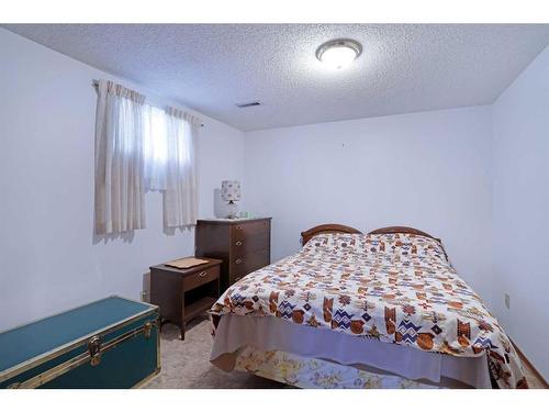 44 Greenbrook Way East, Brooks, AB - Indoor Photo Showing Bedroom