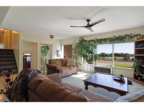 32 Lake Stafford Drive East, Brooks, AB - Indoor Photo Showing Living Room