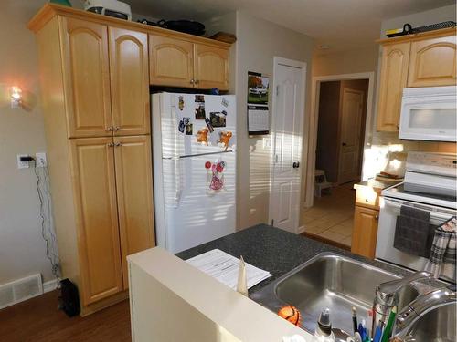 87 Greystone Close East, Brooks, AB - Indoor Photo Showing Kitchen With Double Sink