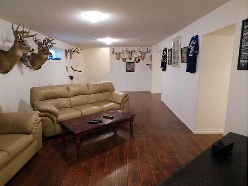 87 Greystone Close East, Brooks, AB - Indoor Photo Showing Living Room