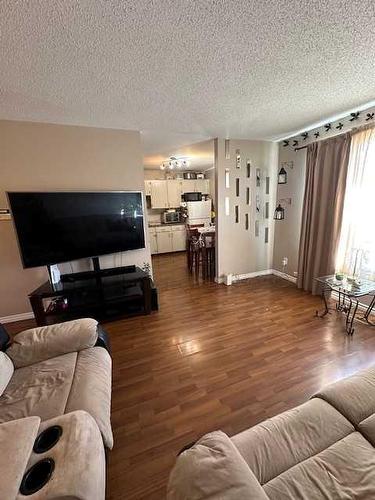 126 Greenbrook Drive East, Brooks, AB - Indoor Photo Showing Living Room