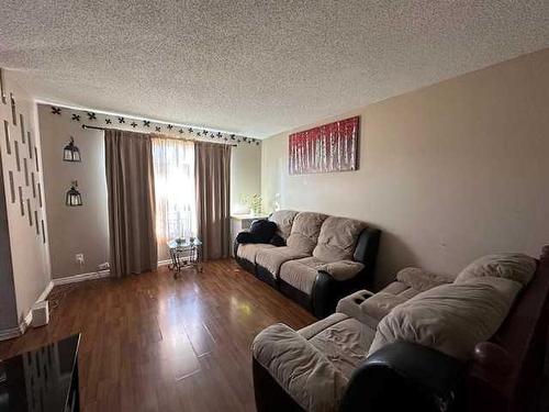 126 Greenbrook Drive East, Brooks, AB - Indoor Photo Showing Living Room