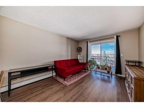 2418-81 Legacy Boulevard Se, Calgary, AB - Indoor Photo Showing Living Room