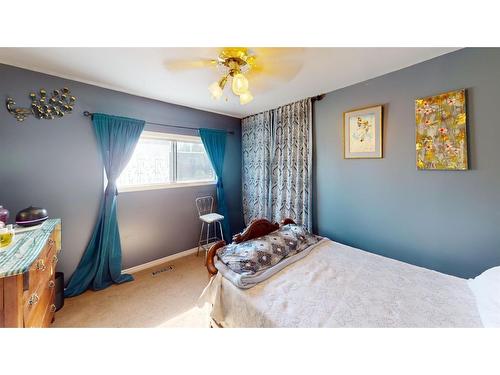 309 Railway Avenue, Rosemary, AB - Indoor Photo Showing Bedroom