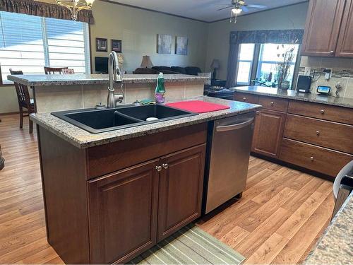 315 6 Avenue East, Hanna, AB - Indoor Photo Showing Kitchen With Double Sink