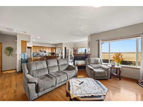 464 Sunset Link, Crossfield, AB - Indoor Photo Showing Living Room