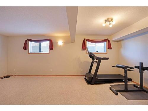 114 Southshore Drive East, Brooks, AB - Indoor Photo Showing Gym Room