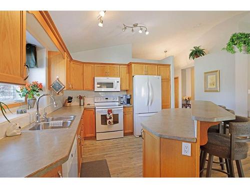 114 Southshore Drive East, Brooks, AB - Indoor Photo Showing Kitchen With Double Sink