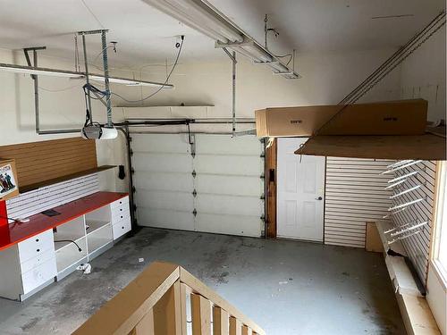 28 Parkland Way East, Brooks, AB - Indoor Photo Showing Garage