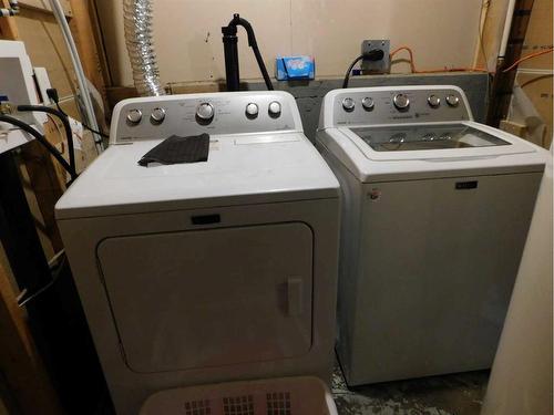 76 Blazier Park Street East, Brooks, AB - Indoor Photo Showing Laundry Room