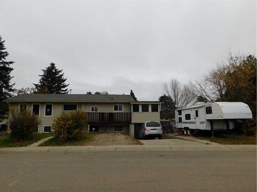 76 Blazier Park Street East, Brooks, AB - Outdoor With Facade