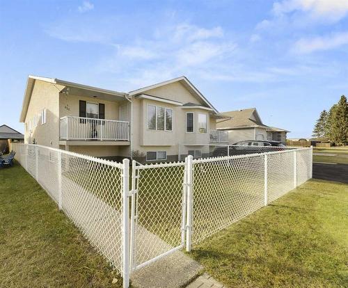 1-625 5Th Avenue Sw, Sundre, AB - Outdoor With Deck Patio Veranda