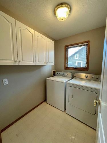 4 Evergreen Park Close West, Brooks, AB - Indoor Photo Showing Laundry Room