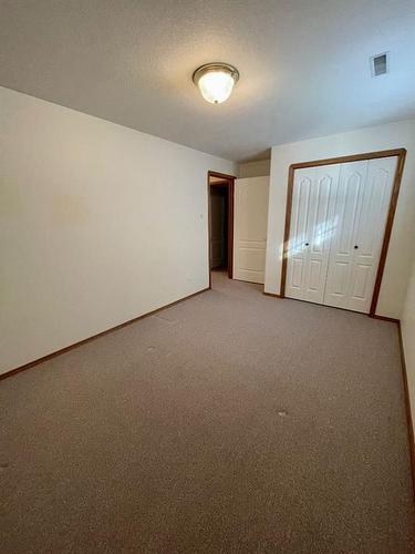 4 Evergreen Park Close West, Brooks, AB - Indoor Photo Showing Other Room