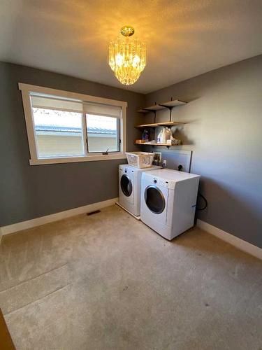 724 2 Street East, Brooks, AB - Indoor Photo Showing Laundry Room