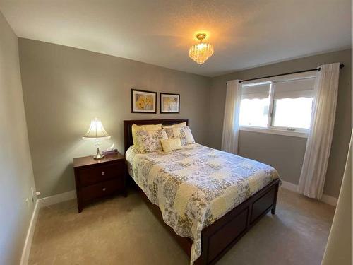 724 2 Street East, Brooks, AB - Indoor Photo Showing Bedroom