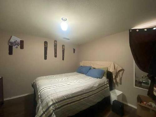 920 2 Avenue West, Brooks, AB - Indoor Photo Showing Bedroom