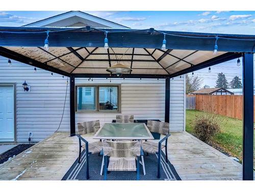 201 4 Avenue West, Hanna, AB - Outdoor With Deck Patio Veranda With Exterior