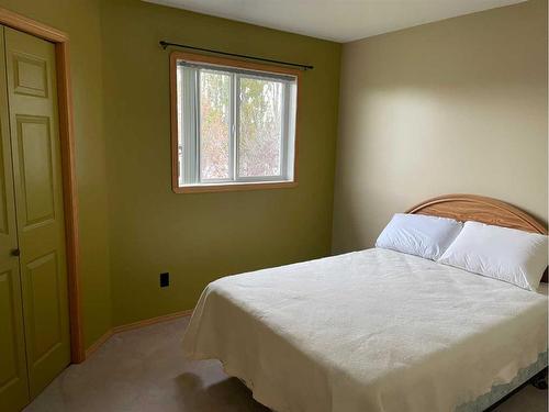 84 Upland Street, Brooks, AB - Indoor Photo Showing Bedroom