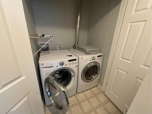 84 Upland Street, Brooks, AB - Indoor Photo Showing Laundry Room