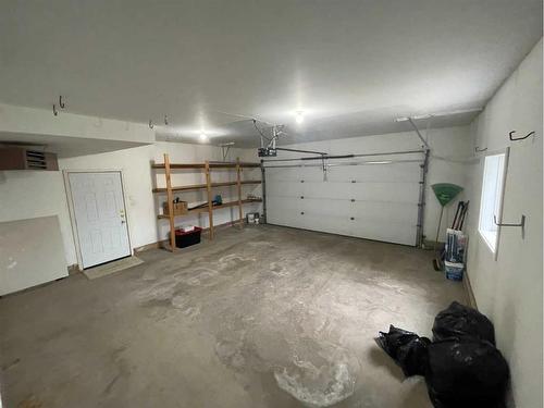 84 Upland Street, Brooks, AB - Indoor Photo Showing Garage