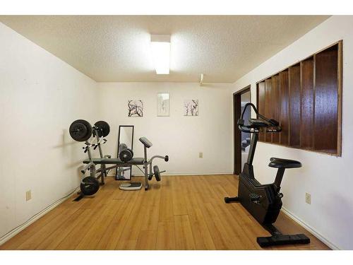 16 Chinook Crescent West, Brooks, AB - Indoor Photo Showing Gym Room