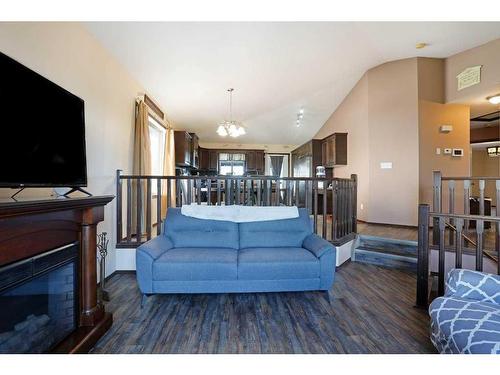 188 Upland Avenue West, Brooks, AB - Indoor Photo Showing Living Room With Fireplace