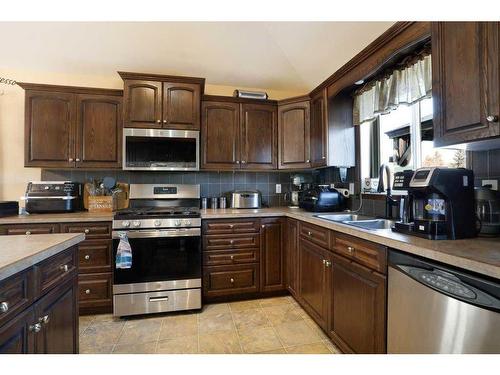 188 Upland Avenue West, Brooks, AB - Indoor Photo Showing Kitchen With Double Sink