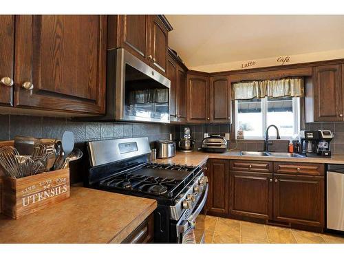 188 Upland Avenue West, Brooks, AB - Indoor Photo Showing Kitchen With Double Sink