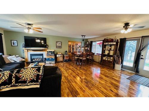 606 2 Avenue, Drumheller, AB - Indoor Photo Showing Living Room With Fireplace