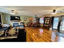 606 2 Avenue, Drumheller, AB  - Indoor Photo Showing Living Room With Fireplace 