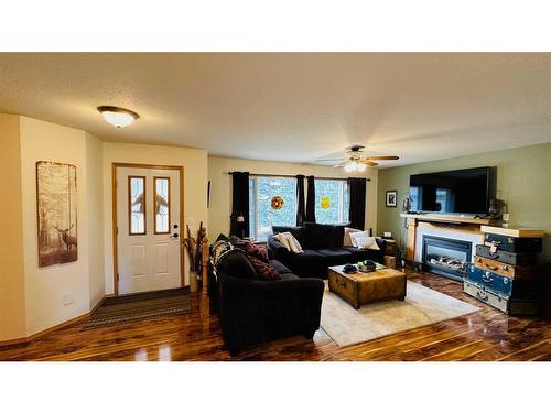 606 2 Avenue, Drumheller, AB - Indoor Photo Showing Living Room With Fireplace