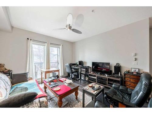 209-52 Cranfield Link Se, Calgary, AB - Indoor Photo Showing Living Room