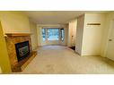 14-830 Birchwood Close, Drumheller, AB  - Indoor With Fireplace 