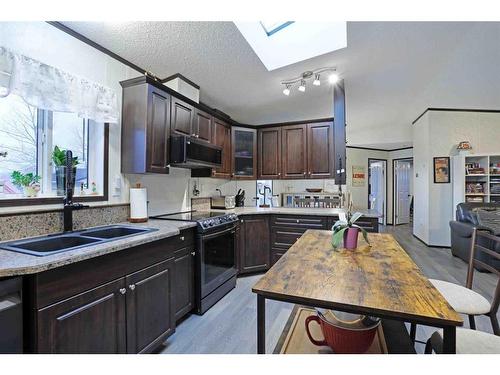 114 2 Avenue East, Delia, AB - Indoor Photo Showing Kitchen With Double Sink