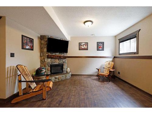 110 Upland Road, Brooks, AB - Indoor With Fireplace