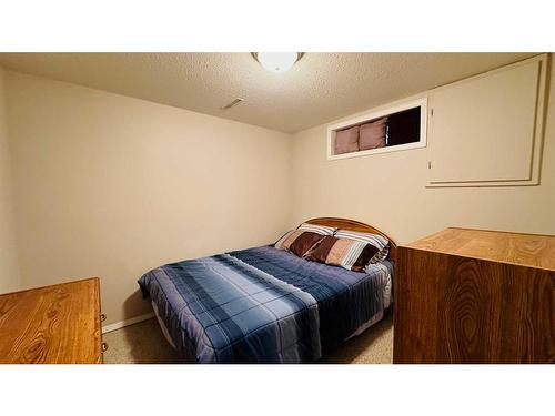 8 Spruce Drive, Drumheller, AB - Indoor Photo Showing Bedroom