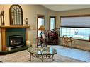 31 Ludor Close East, Brooks, AB  - Indoor Photo Showing Living Room With Fireplace 