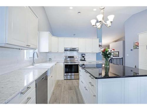 200 Laura Avenue West, Duchess, AB - Indoor Photo Showing Kitchen With Double Sink With Upgraded Kitchen