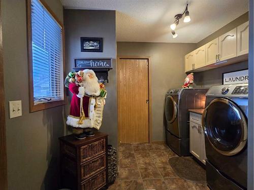 221 10 Avenue Ne, Sundre, AB - Indoor Photo Showing Laundry Room