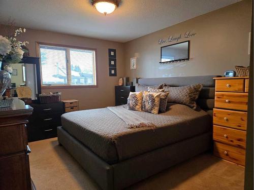 221 10 Avenue Ne, Sundre, AB - Indoor Photo Showing Bedroom