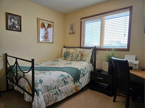 221 10 Avenue Ne, Sundre, AB - Indoor Photo Showing Bedroom