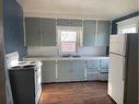 313 4, Bassano, AB  - Indoor Photo Showing Kitchen With Double Sink 