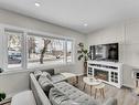 401 Broadway Avenue East, Redcliff, AB  - Indoor Photo Showing Living Room With Fireplace 