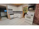 306 Railway West, Hanna, AB  - Indoor Photo Showing Kitchen 