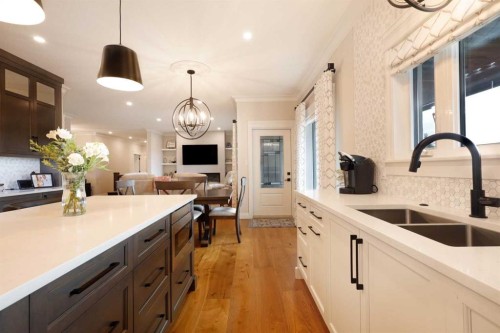 911 2 Avenue West, Brooks, AB - Indoor Photo Showing Kitchen With Double Sink