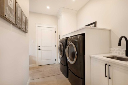 911 2 Avenue West, Brooks, AB - Indoor Photo Showing Laundry Room