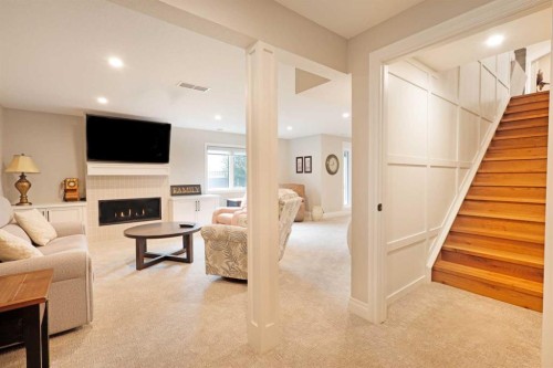 911 2 Avenue West, Brooks, AB - Indoor With Fireplace