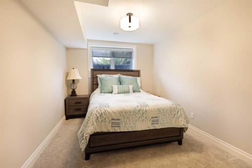 911 2 Avenue West, Brooks, AB - Indoor Photo Showing Bedroom