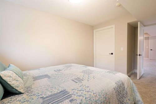 911 2 Avenue West, Brooks, AB - Indoor Photo Showing Bedroom